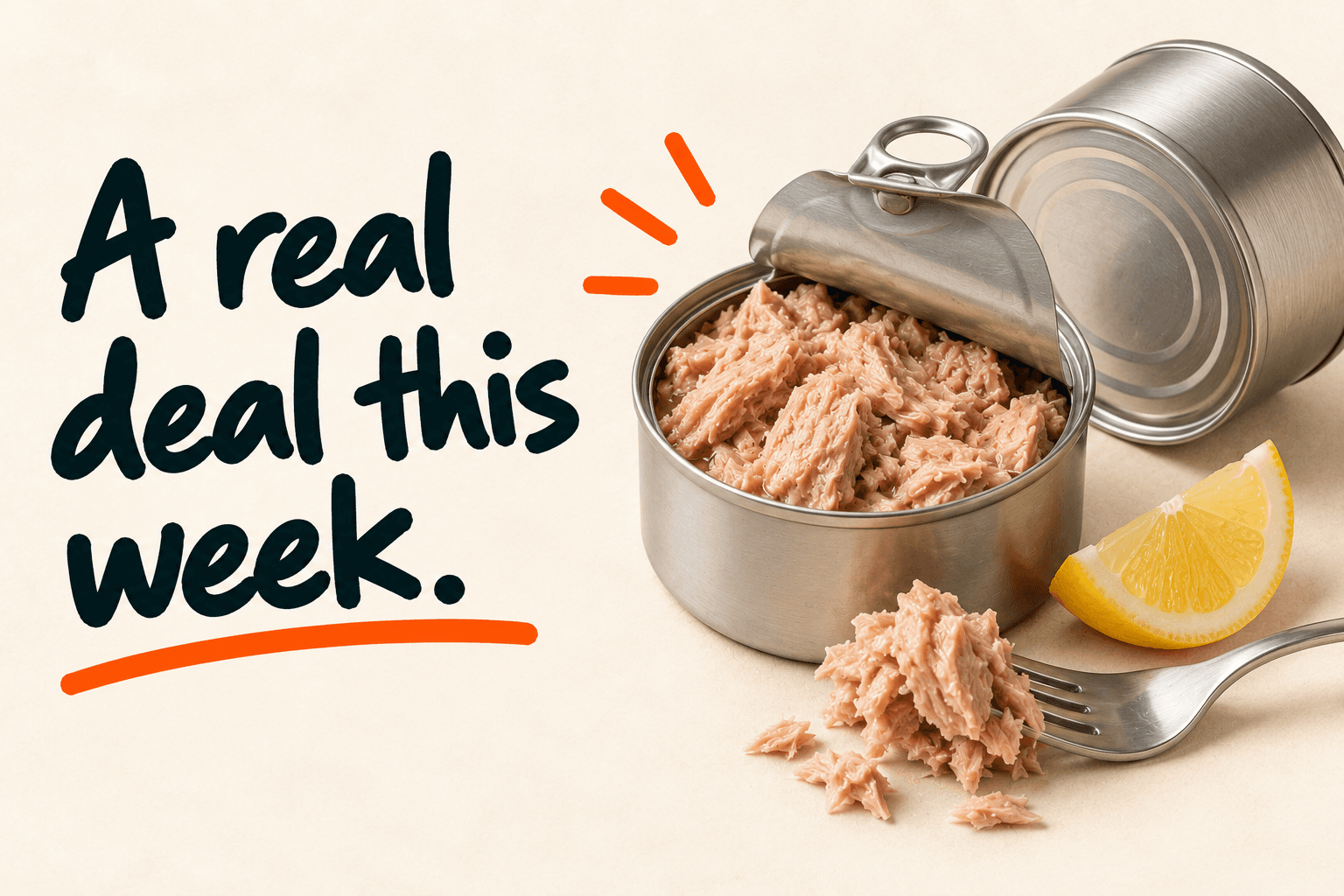 An open tin of chunky tuna with a fork and a lemon wedge. A real deal this week.